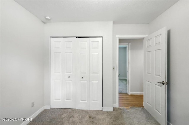 6132 S Northern Lights St, Wasilla, AK 99623 - unfurnished bedroom with carpet floors and a closet