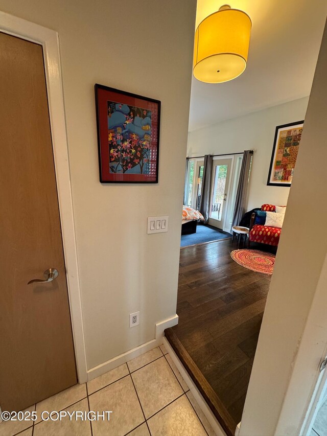 7041 Potter Hts, Anchorage, AK 99516 - hall with baseboards and tile patterned floors