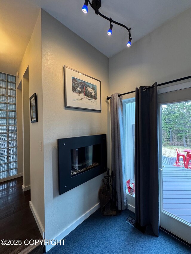 7041 Potter Hts, Anchorage, AK 99516 - interior space featuring baseboards and a glass covered fireplace