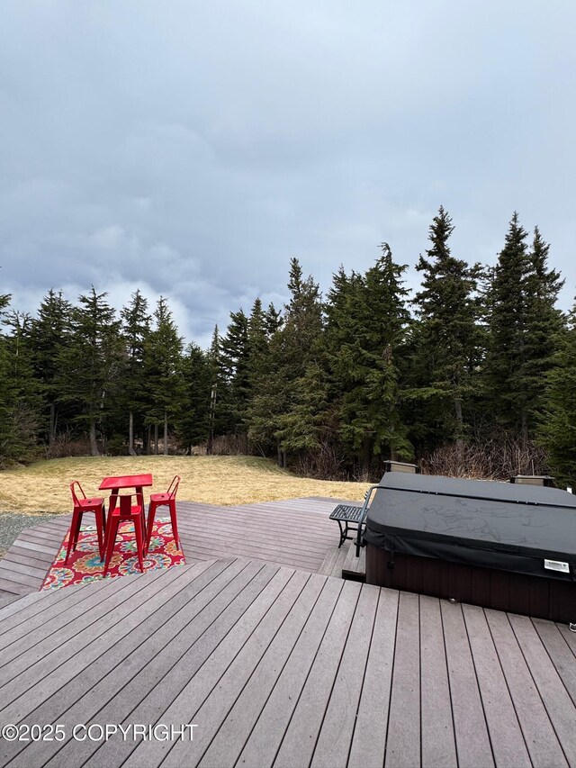 7041 Potter Hts, Anchorage, AK 99516 - wooden deck with a covered hot tub