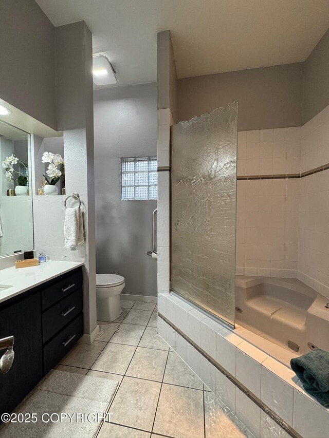 7041 Potter Hts, Anchorage, AK 99516 - full bath with vanity, tile patterned flooring, toilet, and tiled shower