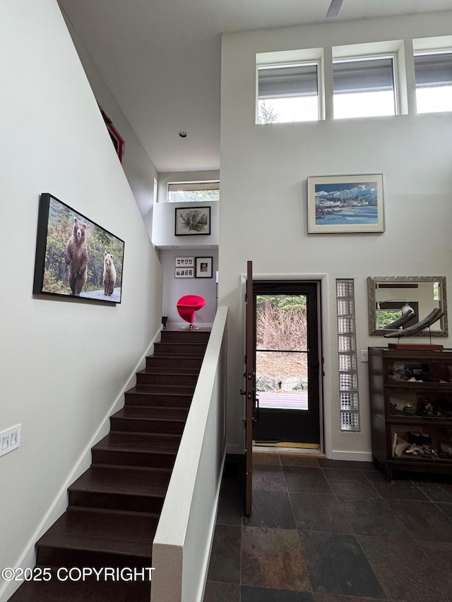staircase with baseboards