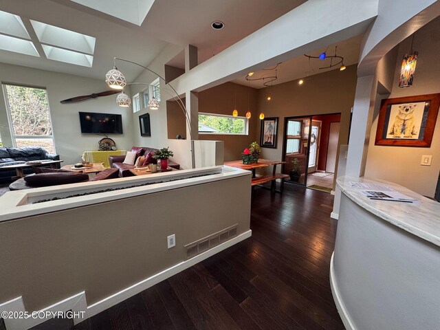 7041 Potter Hts, Anchorage, AK 99516 - kitchen with visible vents, open floor plan, plenty of natural light, and dark wood-type flooring