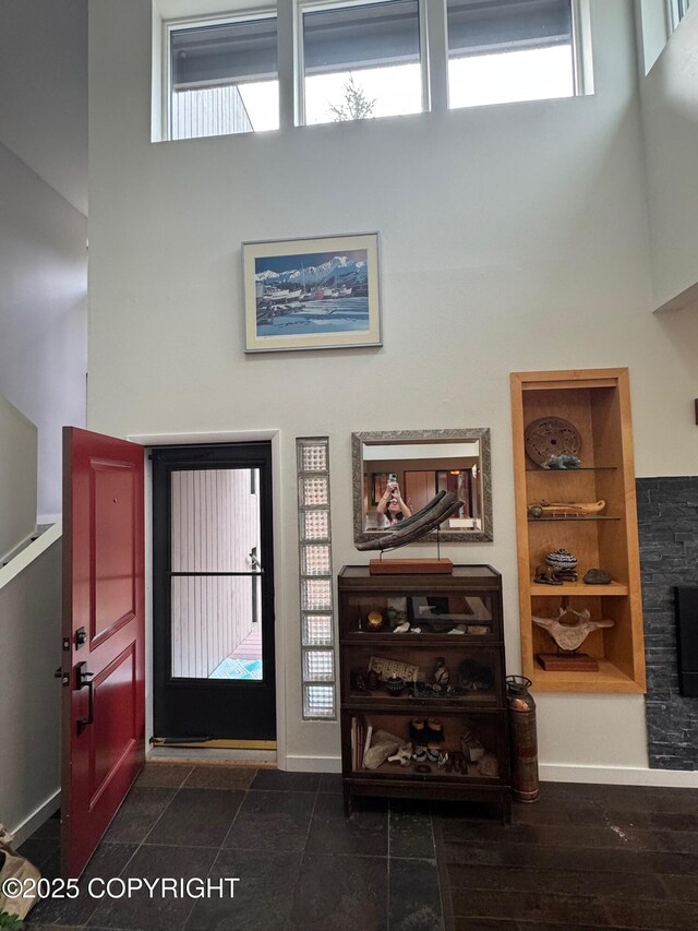7041 Potter Hts, Anchorage, AK 99516 - entryway with plenty of natural light and a towering ceiling