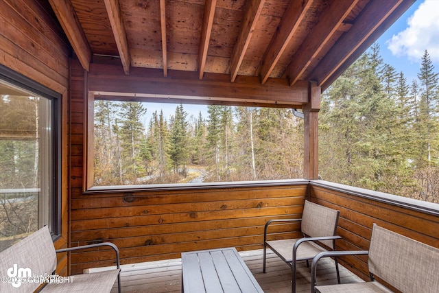 deck featuring a wooded view