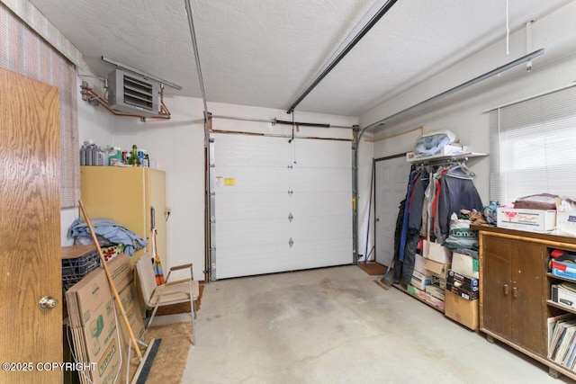 23675 Glacier View Dr, Eagle River, AK 99577 - garage featuring a heating unit