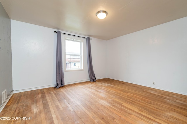 430 Washington St, Ketchikan, AK 99901 - unfurnished room with baseboards and light wood-style flooring