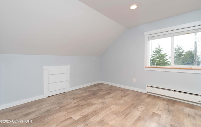 430 Washington St, Ketchikan, AK 99901 - bonus room featuring recessed lighting, baseboards, lofted ceiling, light wood-type flooring, and a baseboard heating unit