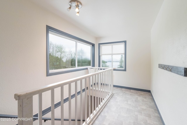 430 Washington St, Ketchikan, AK 99901 - hallway with baseboards and an upstairs landing