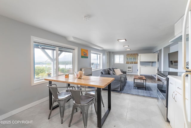 430 Washington St, Ketchikan, AK 99901 - dining room featuring baseboards and light floors