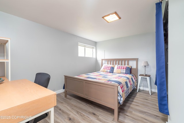 430 Washington St, Ketchikan, AK 99901 - bedroom with baseboards and wood finished floors