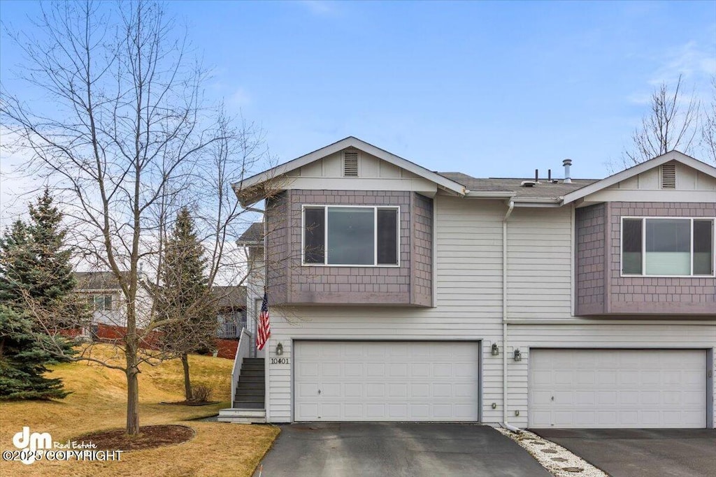 10401 Valley Park Dr, Anchorage, AK 99507 - view of front of house featuring driveway and an attached garage