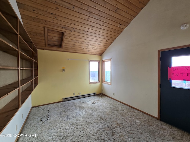 empty room featuring plenty of natural light, carpet floors, vaulted ceiling, and wooden ceiling