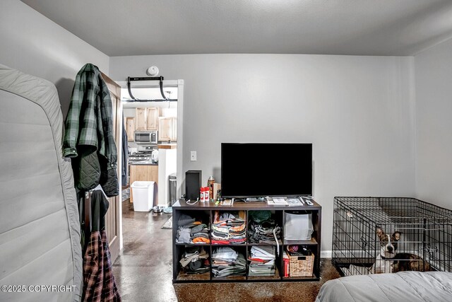 bedroom with concrete floors