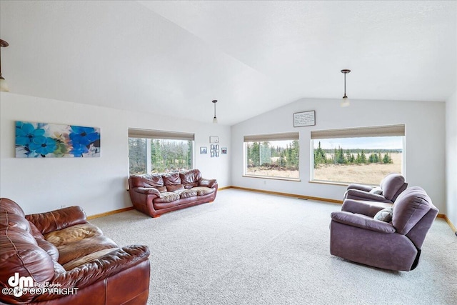 living room with vaulted ceiling, baseboards, and carpet floors