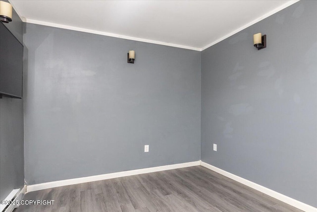 1369 Morning Glory Loop, North Pole, AK 99705 - spare room featuring wood finished floors and baseboards