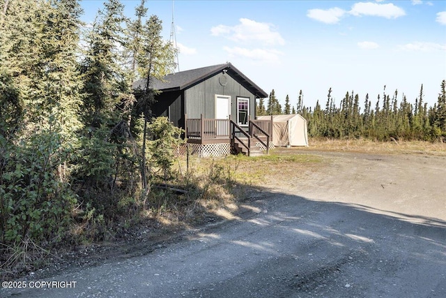 1369 Morning Glory Loop, North Pole, AK 99705 - view of side of home featuring driveway