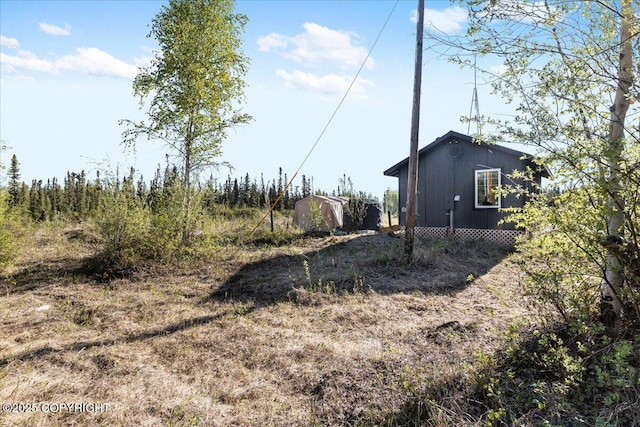 1369 Morning Glory Loop, North Pole, AK 99705 - view of yard featuring an outdoor structure
