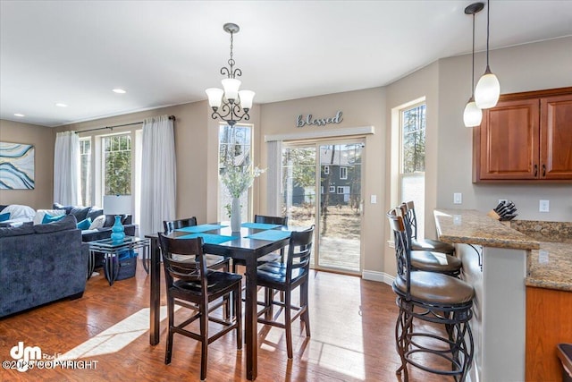 7865 S Settlers Bay Dr, Wasilla, AK 99623 - dining area featuring dark wood-style flooring, a notable chandelier, and recessed lighting