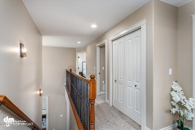 7865 S Settlers Bay Dr, Wasilla, AK 99623 - hall with carpet floors, recessed lighting, baseboards, and an upstairs landing