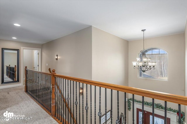 7865 S Settlers Bay Dr, Wasilla, AK 99623 - hall featuring recessed lighting, carpet, a chandelier, and an upstairs landing