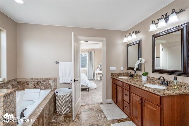 7865 S Settlers Bay Dr, Wasilla, AK 99623 - bathroom with a sink, a garden tub, ensuite bath, and double vanity