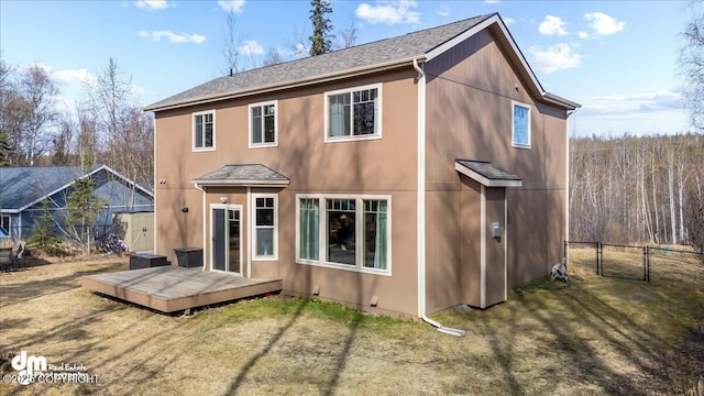 7865 S Settlers Bay Dr, Wasilla, AK 99623 - rear view of property with fence, roof with shingles, a wooden deck, a gate, and a yard