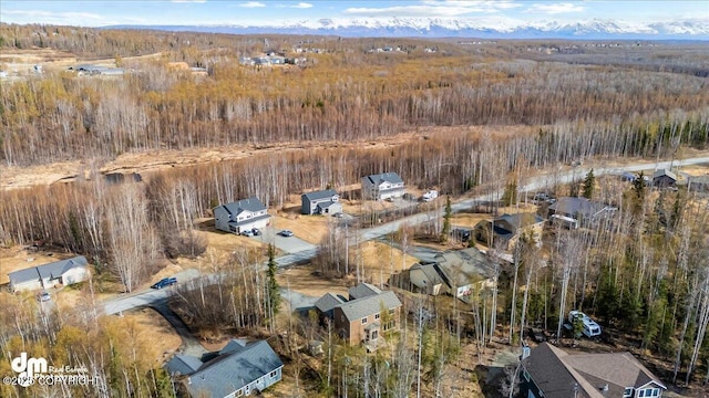 7865 S Settlers Bay Dr, Wasilla, AK 99623 - birds eye view of property featuring a view of trees
