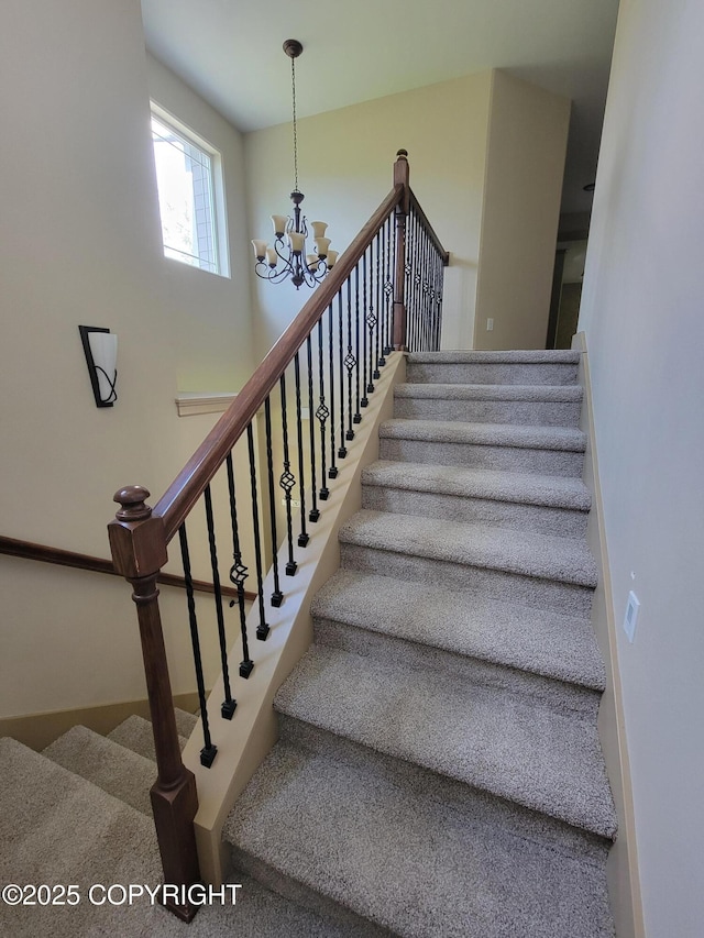 7779 N Showers St, Palmer, AK 99645 - staircase featuring an inviting chandelier