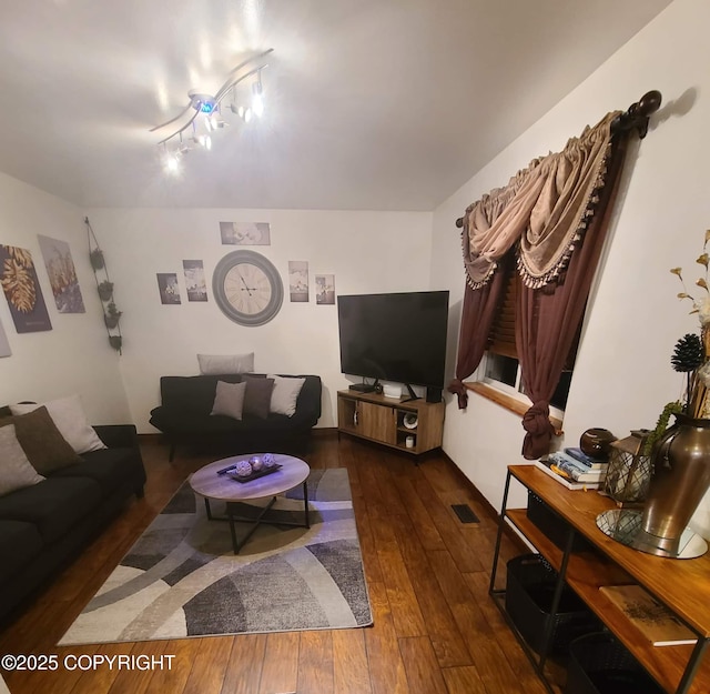 living area featuring hardwood / wood-style floors