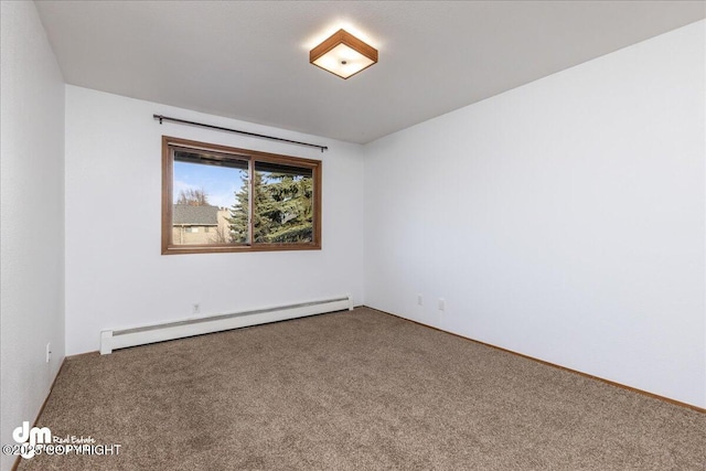 4241 Folker St # D202, Anchorage, AK 99508 - spare room featuring carpet floors and a baseboard radiator