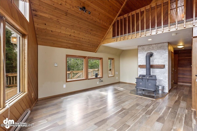 337 Alta Dr, Girdwood, AK 99587 - unfurnished living room with light wood-type flooring, baseboards, high vaulted ceiling, and wooden ceiling