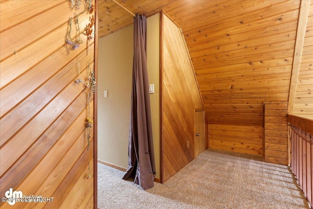 337 Alta Dr, Girdwood, AK 99587 - hallway featuring wooden walls, carpet floors, and wooden ceiling