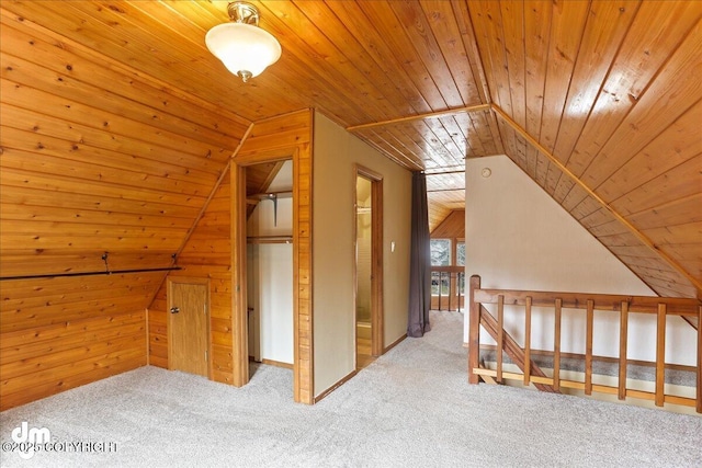 337 Alta Dr, Girdwood, AK 99587 - additional living space with wood walls, carpet, lofted ceiling, and wood ceiling