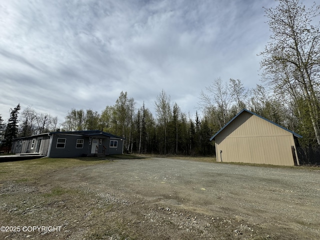 3140 N Brocton Ave, Wasilla, AK 99654 - view of yard with dirt driveway