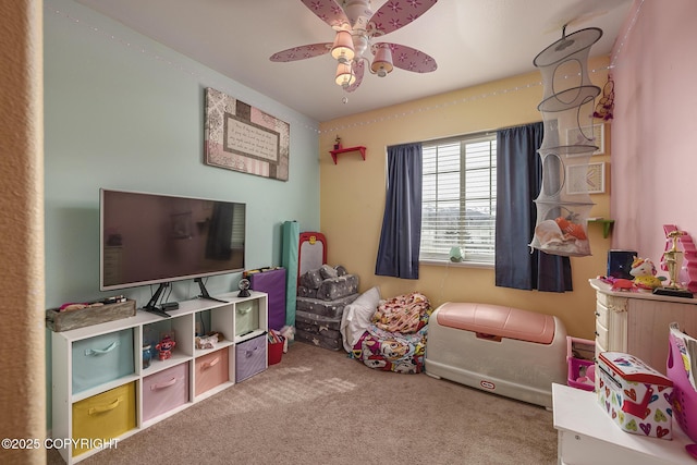 game room with carpet and a ceiling fan