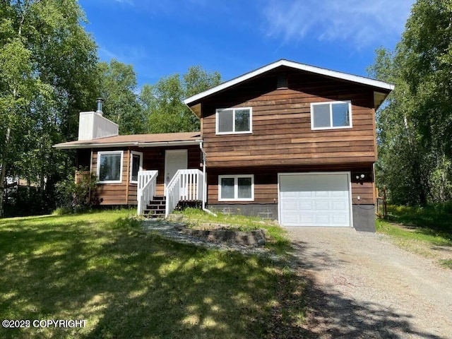 5875 E Alder Cir, Wasilla, AK 99654 - tri-level home with a garage, dirt driveway, a chimney, and a front yard