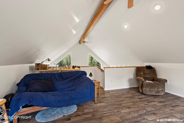 bedroom featuring wood finished floors, baseboards, visible vents, and vaulted ceiling with beams