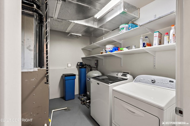 washroom featuring laundry area and independent washer and dryer