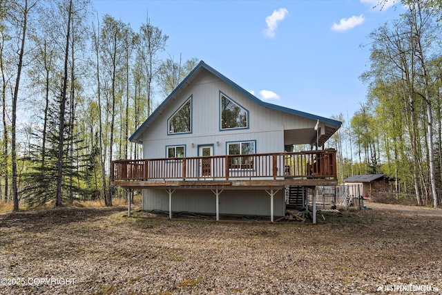 rear view of house with a deck