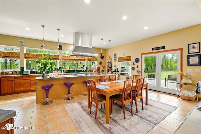 8115 N Highlander, Wasilla, AK 99654 - dining area with light tile patterned floors and recessed lighting