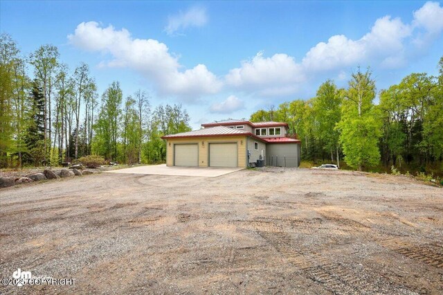 8115 N Highlander, Wasilla, AK 99654 - garage featuring driveway