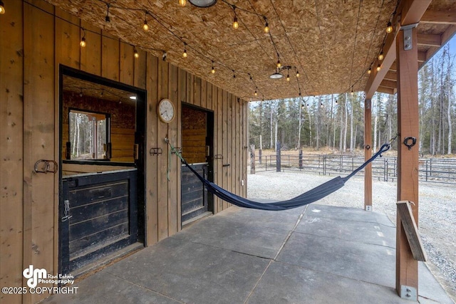 view of patio featuring an exterior structure and an outbuilding