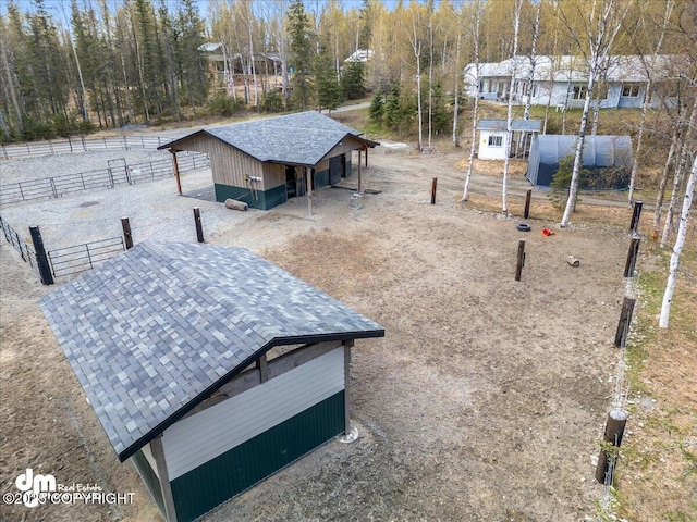 surrounding community featuring an outbuilding and an exterior structure