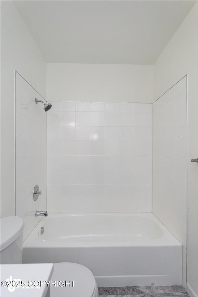 full bathroom with toilet and shower / washtub combination