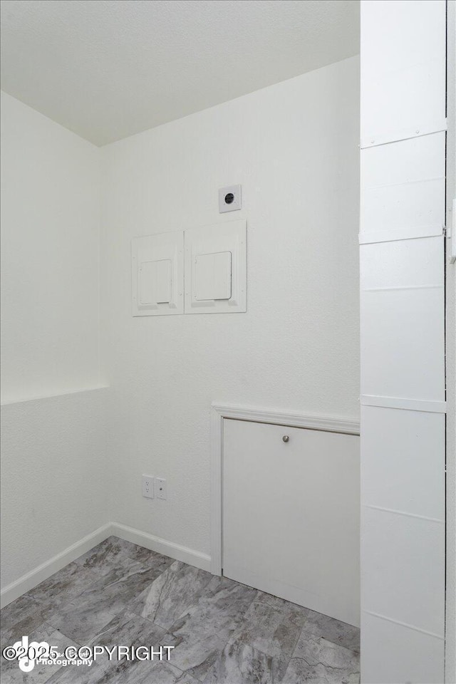 empty room with baseboards