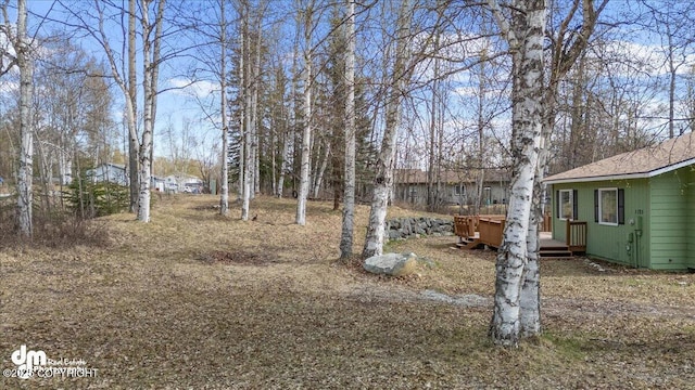 view of yard featuring a deck