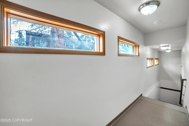 8515 Jewel Lake Rd # 25, Anchorage, AK 99502 - hallway featuring healthy amount of natural light