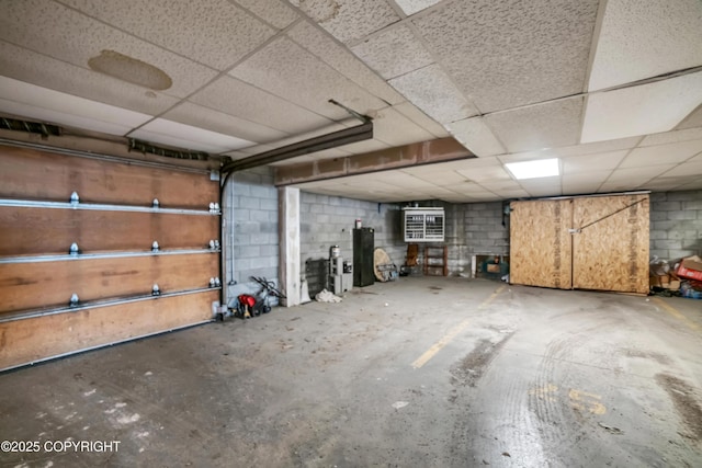 8515 Jewel Lake Rd # 25, Anchorage, AK 99502 - garage featuring concrete block wall
