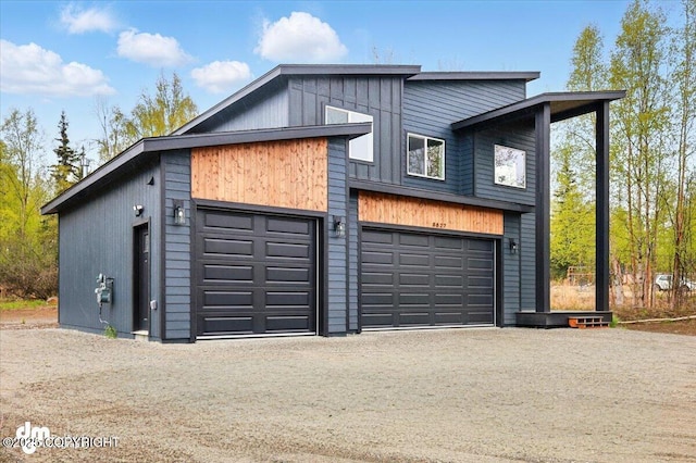 garage featuring driveway